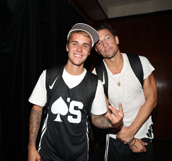 Justin Bieber, left, and Carl Lentz attend a charity basketball game at Madison Square Garden in New York City on Aug. 13, 2017.