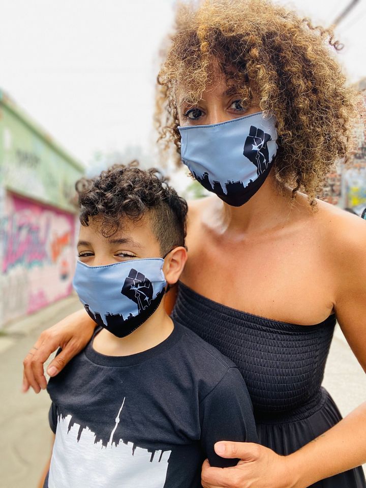 Nadia Lloyd with her son wearing the Black Lives Matter facemasks.
