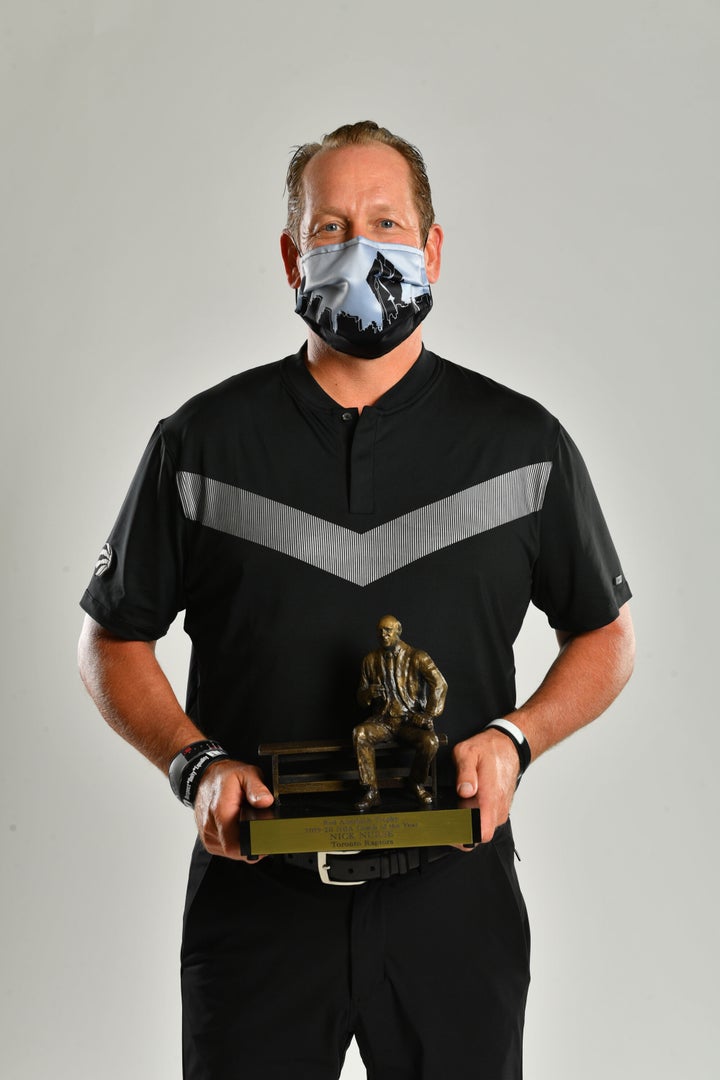 Nick Nurse's Coach of the Year photo wearing Nadia's BLM mask.