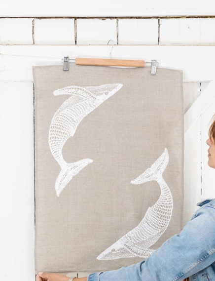 Quandamooka artist Delvene Cockatoo-Collins (above) shows her Migaloo artwork on linen at her Minjerribah (North Stradbroke Island) studio.