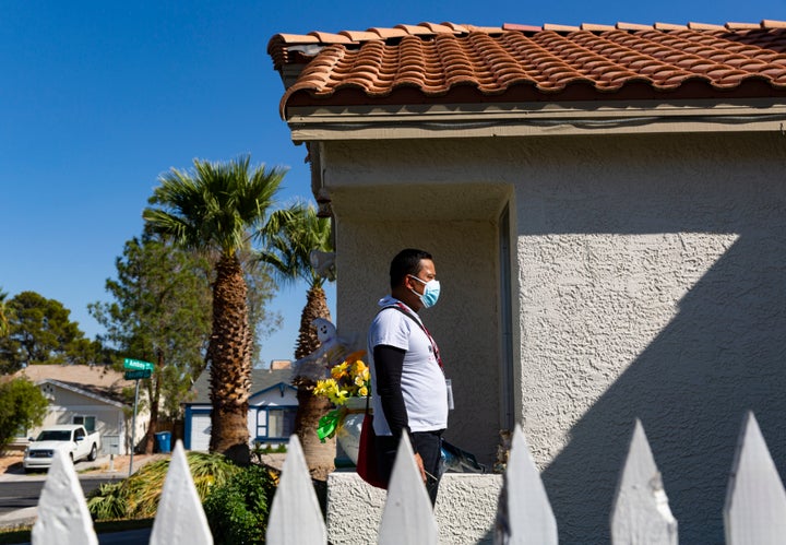 Norberto Meniano, a member of Unite Here Local 226, canvasses a Las Vegas neighborhood in support of Democratic presidential nominee Joe Biden on Oct. 22.