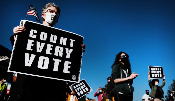 People participate in a protest in support of counting all votes on Nov. 4 in Philadelphia as the election in Pennsylvania is still unresolved.