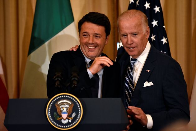 Italian Prime Minister Matteo Renzi and US Vice President Joe Biden share a joke as Renzi speaks on ...