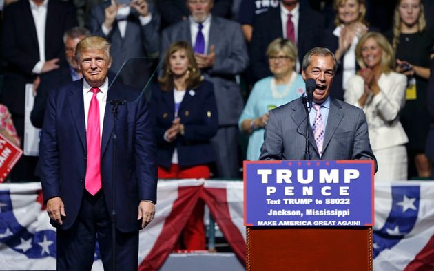 Nigel Farage, ex-leader of the British UKIP party, speaks as Republican presidential candidate Donald Trump, left, listens, at Trump's campaign rally in Jackson, Miss., Wednesday, Aug. 24, 2016. (AP Photo/Gerald Herbert)