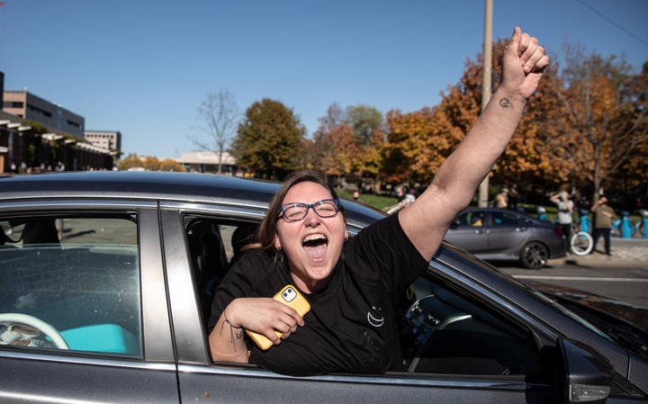 People celebrate from their cars outside Independence Mall in Philadelphia on Nov. 7.