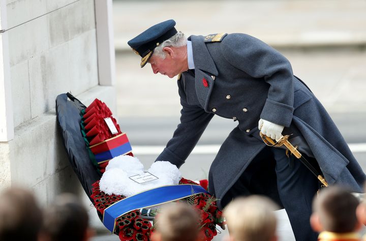 The Prince of Wales lays a wreath during the Remembrance Sunday service at the Cenotaph, in Whitehall, London.