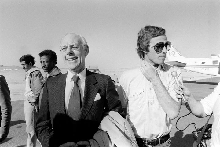 Denis Thatcher, left, with his son Mark Thatcher in January 1982. They're leaving the Algerian president's private jet after Mark was rescued during the Paris-Dakar rally.