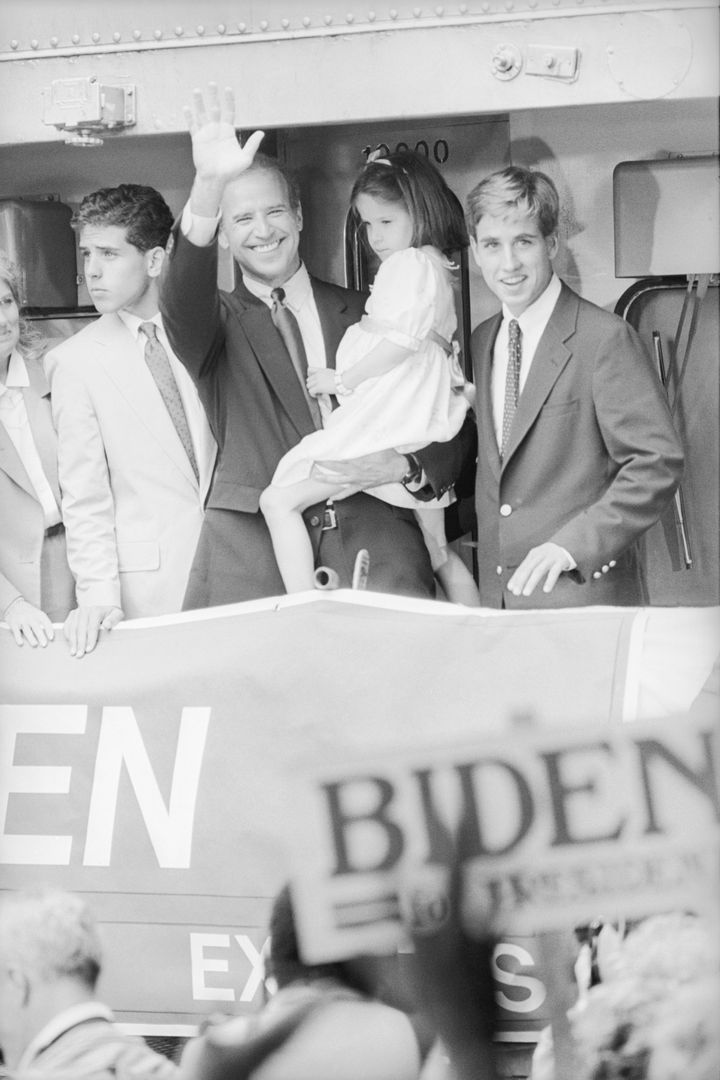 Joe Biden holds his five-year-old daughter Ashley, flanked by his sons, Hunter and Beau, in 1987.