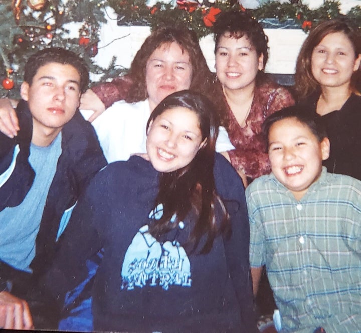 Bernice Catcheway, (second top left) and Jennifer Catcheway (below Bernice) and her siblings in happier times before she went missing.