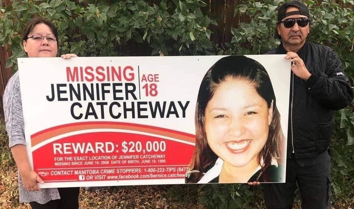 Bernice and Wilfred Catcheway hold a sign for their missing daughter Jennifer. The couple has searched thousands of hours and hundreds of miles in the 12 years since she disappeared. 