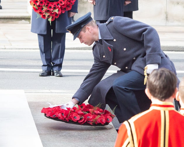 Prince William lays a wreath.