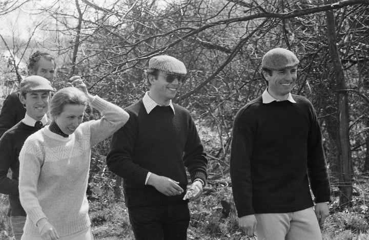 Princess Anne, her husband Mark Phillips, and bodyguard Peter Cross at the Planters International Cross Country Day in Surrey on April 12, 1980.