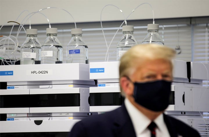Donald Trump tours the Fujifilm Diosynth Biotechnologies' Innovation Center, a pharmaceutical manufacturing plant where components for a potential COVID-19 vaccine candidate are being developed in Morrrisville, North Carolina, on July 27, 2020.