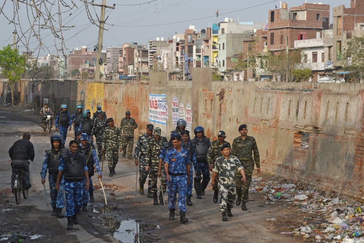 Rapid Action Force (RAF) personnel patrol the lanes at Shiv Vihar, Mustafabad, on March 1, 2020, in New Delhi, India.