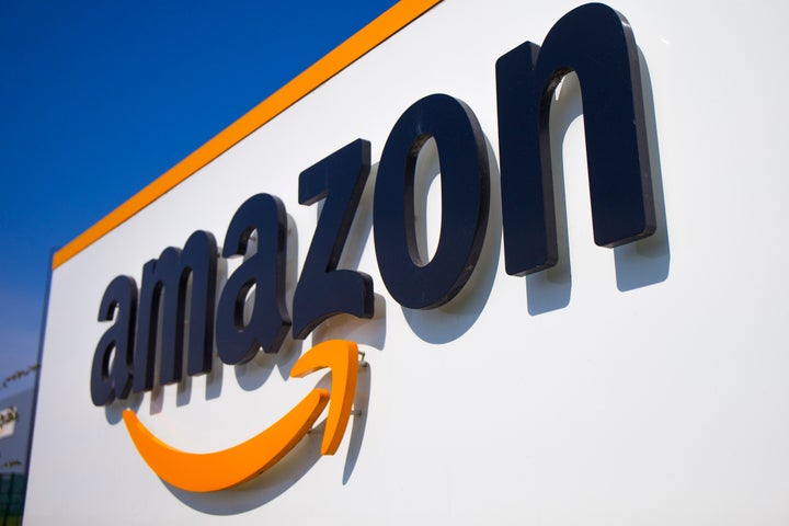 In this Thursday, April 16, 2020 file photo, a logo at the entrance of Amazon, in Douai, northern France. (AP Photo/Michel Sp