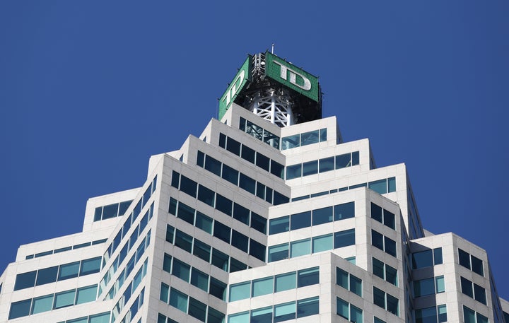 The TD bank logo is seen on top of the Toronto Dominion Canada Trust Tower in Toronto, March 16, 2017. TD Bank says it won't finance oil and gas-related activities in the Arctic.