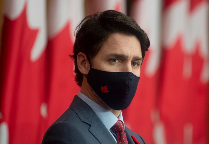 Prime Minister Justin Trudeau listens during a news conference in Ottawa on Nov. 10, 2020.