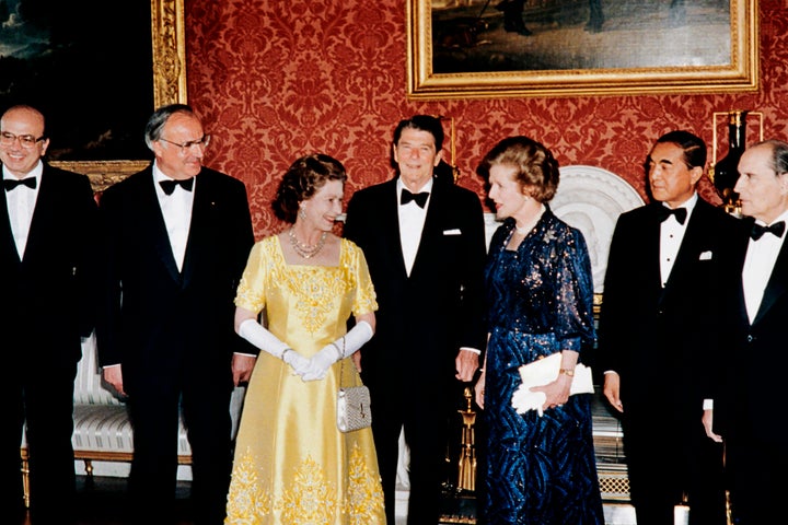 Queen Elizabeth II and Margaret Thatcher along with French President François Mitterrand, Japanese Prime Minister Yasuhiro Nakasone, U.S. President Ronald Reagan, Chancelor Helmut Kohl of West Germany and Italian Prime Minister Bettino Craxi at Buckingham Palace on Sept. 6, 1984.