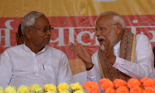 A file photo of Nitish Kumar (left) with Prime Minister Narendra