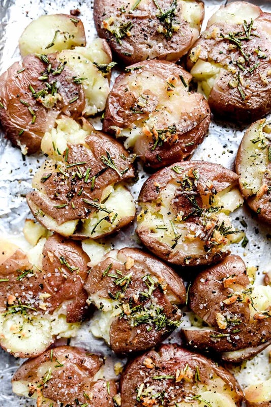 Rosemary Garlic Butter Smashed Potatoes from Foodie Crush