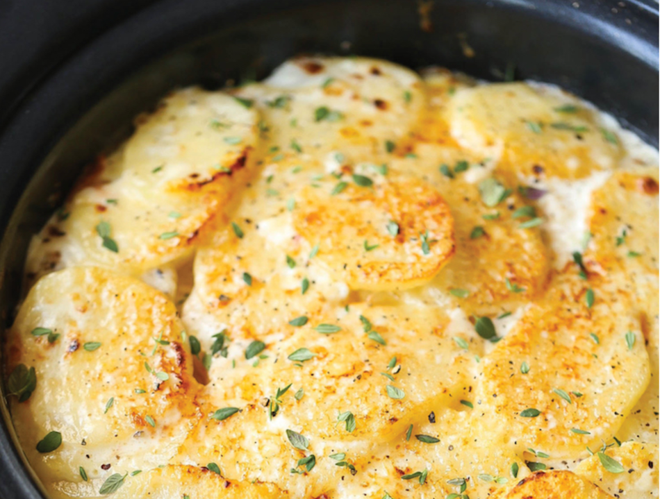 Slow Cooker Cheesy Scalloped Potatoes from Damn Delicious