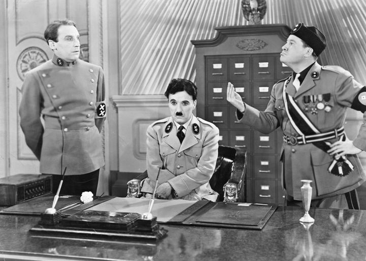 (Original Caption) Charlie Chaplin as Hitler and Jack Oakie as Mussolini in the United Artist picture The Great Dictator (1940). (Photo by George Rinhart/Corbis via Getty Images)
