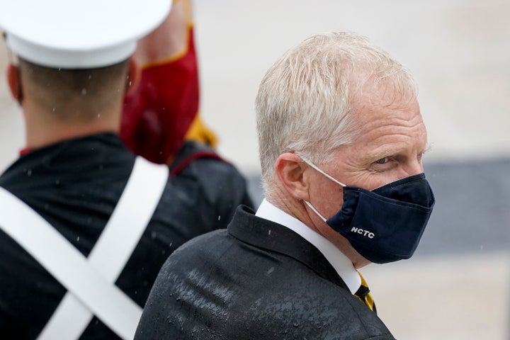 Acting Secretary of Defense Christopher Miller attends a Veterans Day wreath laying ceremony led by President Donald Trump at the Tomb of the Unknown Soldier at Arlington National Cemetery in Arlington, Va., Wednesday, Nov. 11, 2020. (AP Photo/Patrick Semansky)