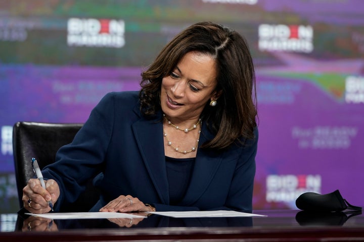 Kamala Harris signing the required documents to receive the democratic nomination for vice president in Wilmington, Delaware, on Aug. 14, 2020.