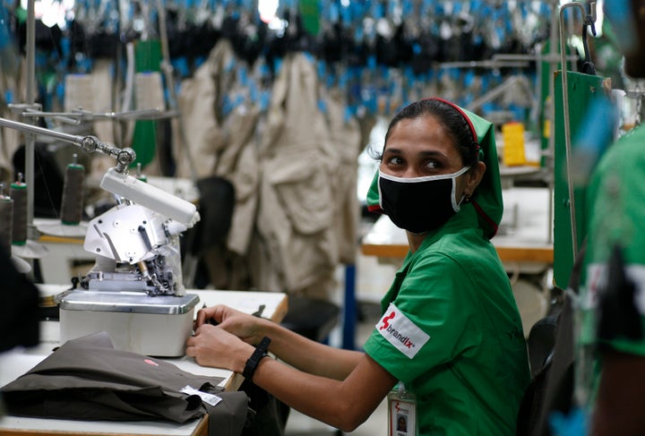 A factory worker looks on during the opening ceremony of Sri Lanka's first converted green factory by Brandix in Colombo, April 25, 2008. 