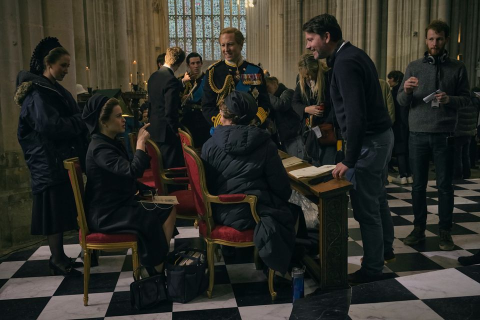 Benjamin Caron directing some of the cast on set