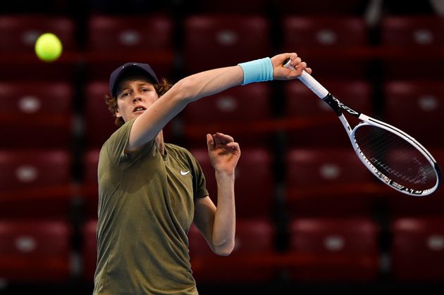 Italy's Jannik Sinner hits a return against Canada's Vasek Pospisil during the final match of the ATP...