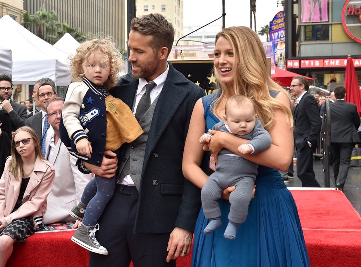 Ryan Reynolds and Blake Lively with their daughters James and Inez on the Hollywood Walk of Fame on Dec. 15, 2016.