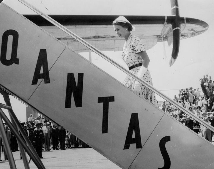 Queen Elizabeth boards a Qantas flight during her royal tour in 1954. 