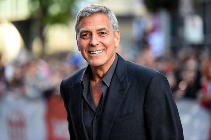 After the crash, George Clooney remembers that &ldquo;all these people came and stood over me and just pulled out their phone