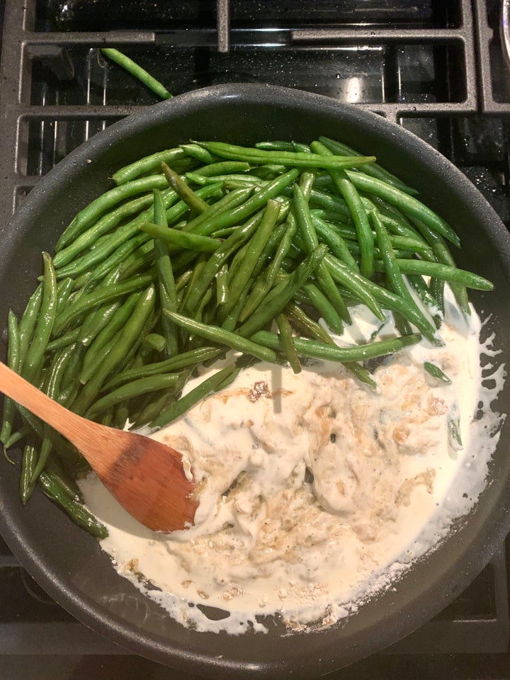 The author whipping up Home Chef's Thanksgiving side recipe for caramelized onion green bean casserole. As an added bonus, most recipes could be made with one or two pots and pans.