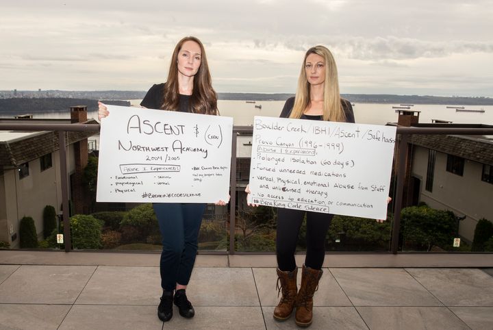 Jenny Talbot, left, and Juli-Ann Aaron create signs detailing some of the abuse they faced at U.S. treatment programs. The two met for the first time at Talbot's home in West Vancouver, B.C., on Oct. 18, 2020.
