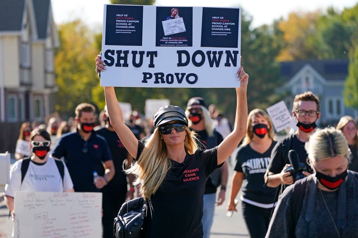 Paris Hilton, centre, leads a protest outside Provo Canyon School in Provo, Utah on Oct. 9, 2020.