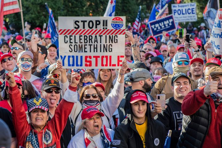 Trump supporters echo Trump's false allegations of voter fraud outside the Supreme Court during the Million Maga March protest on Nov. 14, 2020. 