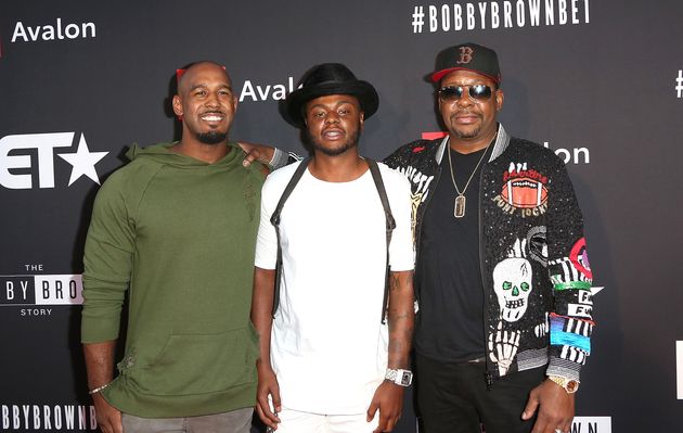 Bobby Brown Jr. (centre) with his brother Landon Brown (left) and father Bobby Brown.