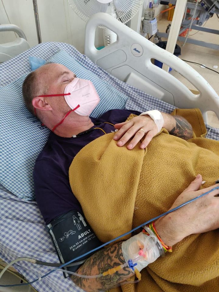 Former healthcare worker Ian Jones, pictured here in intensive care after suffering the snake bite while fighting Covid-19. 