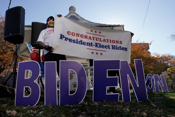 Joe Biden supporters in Milwaukee react to the announcement on Nov. 7 that Biden defeated Trump in the presidential election.