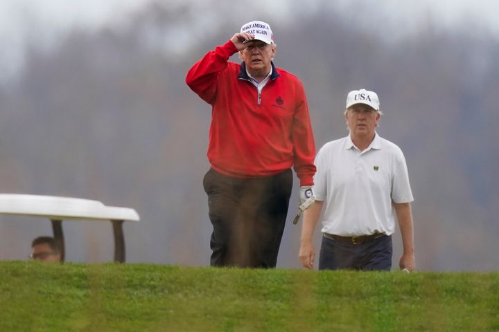 President Donald Trump plays golf at Trump National Golf Club in Sterling, Virginia, on Saturday.