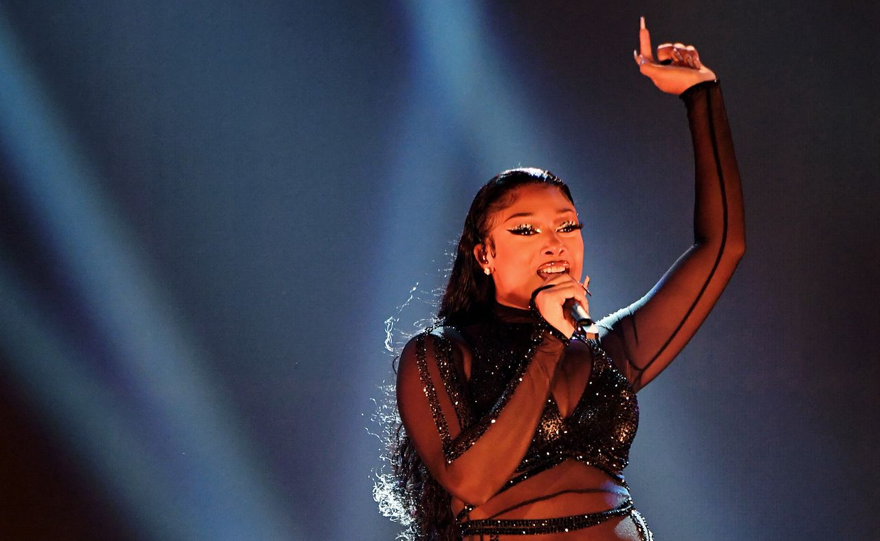 Megan Thee Stallion performs onstage for the 2020 American Music Awards. 