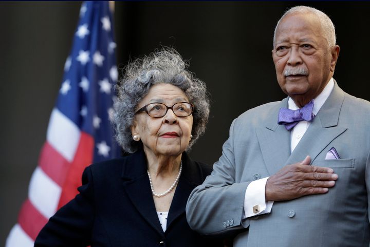 Former New York City Mayor David Dinkins, right, and his wife, Joyce Dinkins, participate in a ceremony renaming the Manhattan Municipal Building to the David N. Dinkins Building, in New York on Oct. 15, 2015.