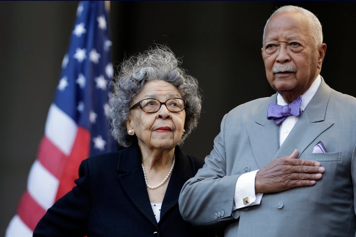 Former New York City Mayor David Dinkins, right, and his wife, Joyce Dinkins, participate in a ceremony renaming the Manhatta