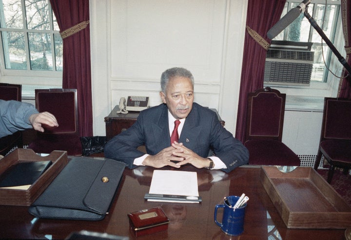 Former Mayor David Dinkins tries out his new desk on Jan. 1, 1990 at City Hall in New York prior to his inauguration ceremony