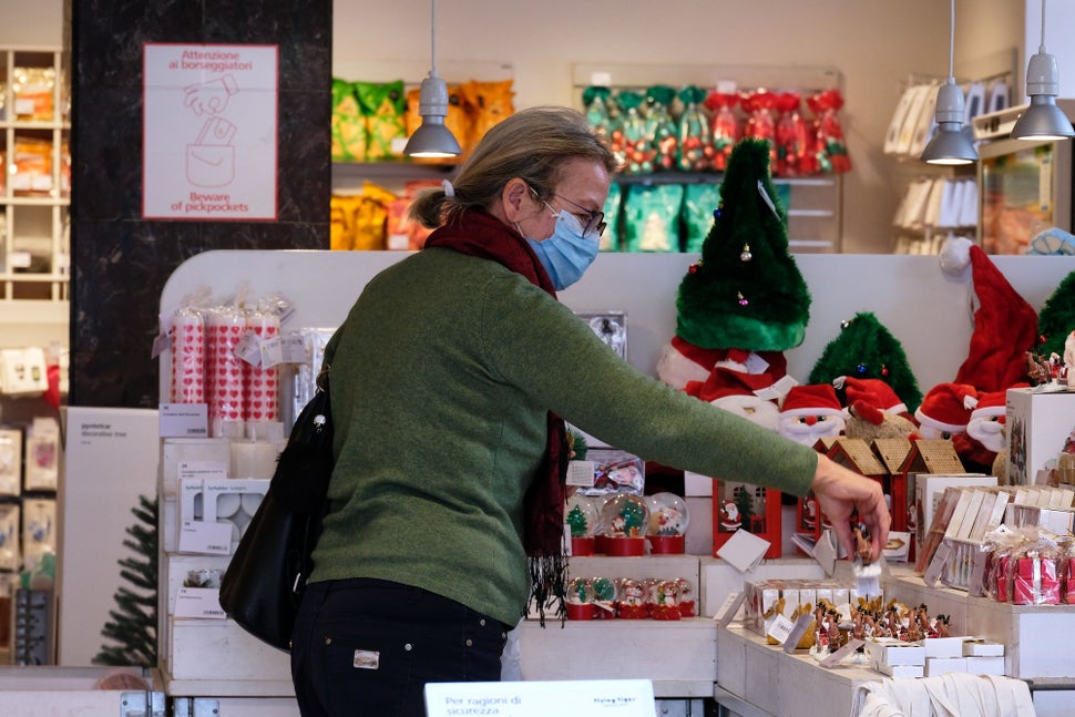 A shopper looks for a gift in central Rome in early November. Italian Prime Minister Giuseppe Conte&nbsp;has said that he wan