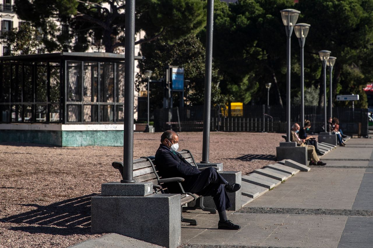 People wearing face masks in downtown Madrid on Monday. The Spanish government revealed Tuesday morning that family and social gatherings could be limited to six people.