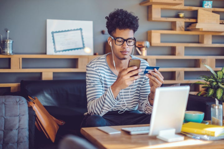 Young man working at home office