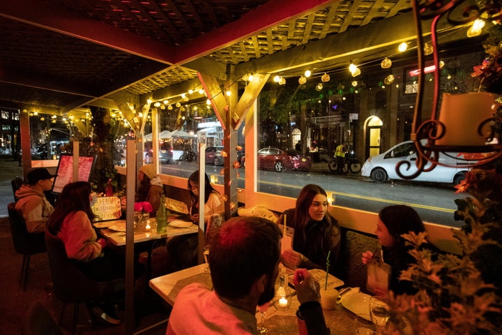 People enjoy outdoor dining on Nov. 21 at Sveta, a New York City restaurant, as the spread of the coronavirus disease continues.